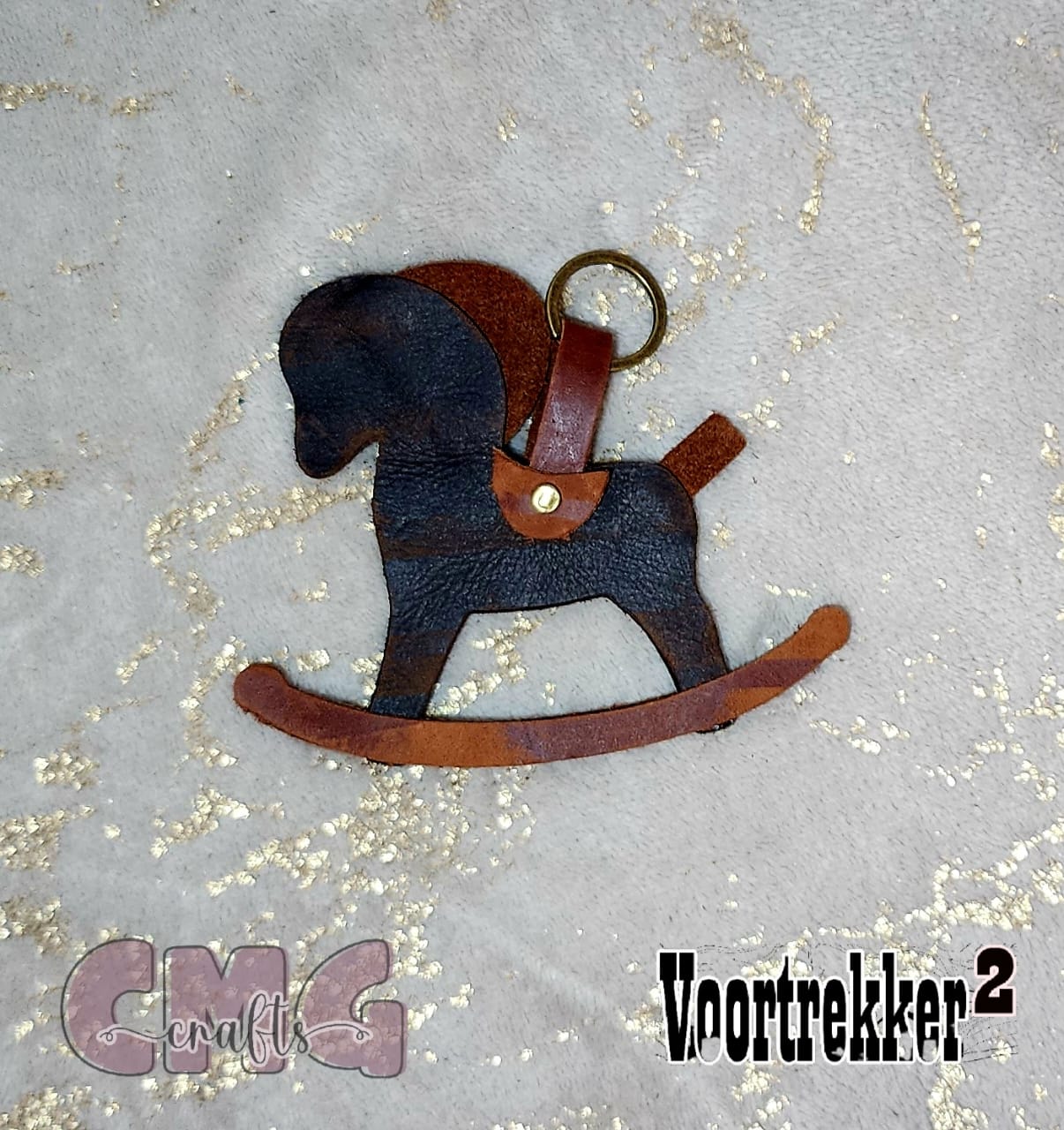Handgemaakte egte leer ryperdjie-sleutelhangers