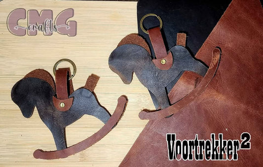 Handgemaakte egte leer ryperdjie-sleutelhangers